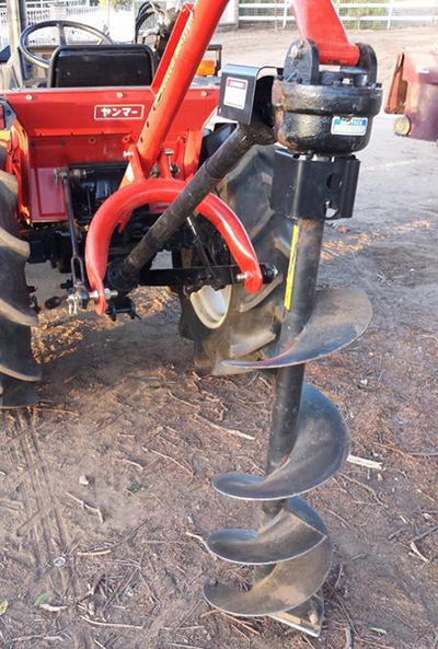 Auger for drilling post holes
