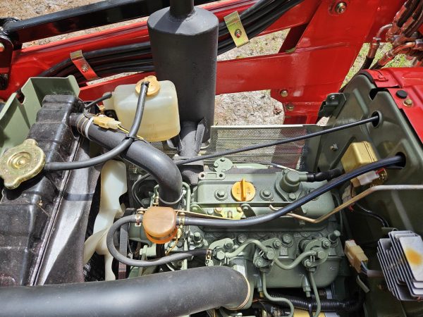 engine bay view of red YM1720D tractor